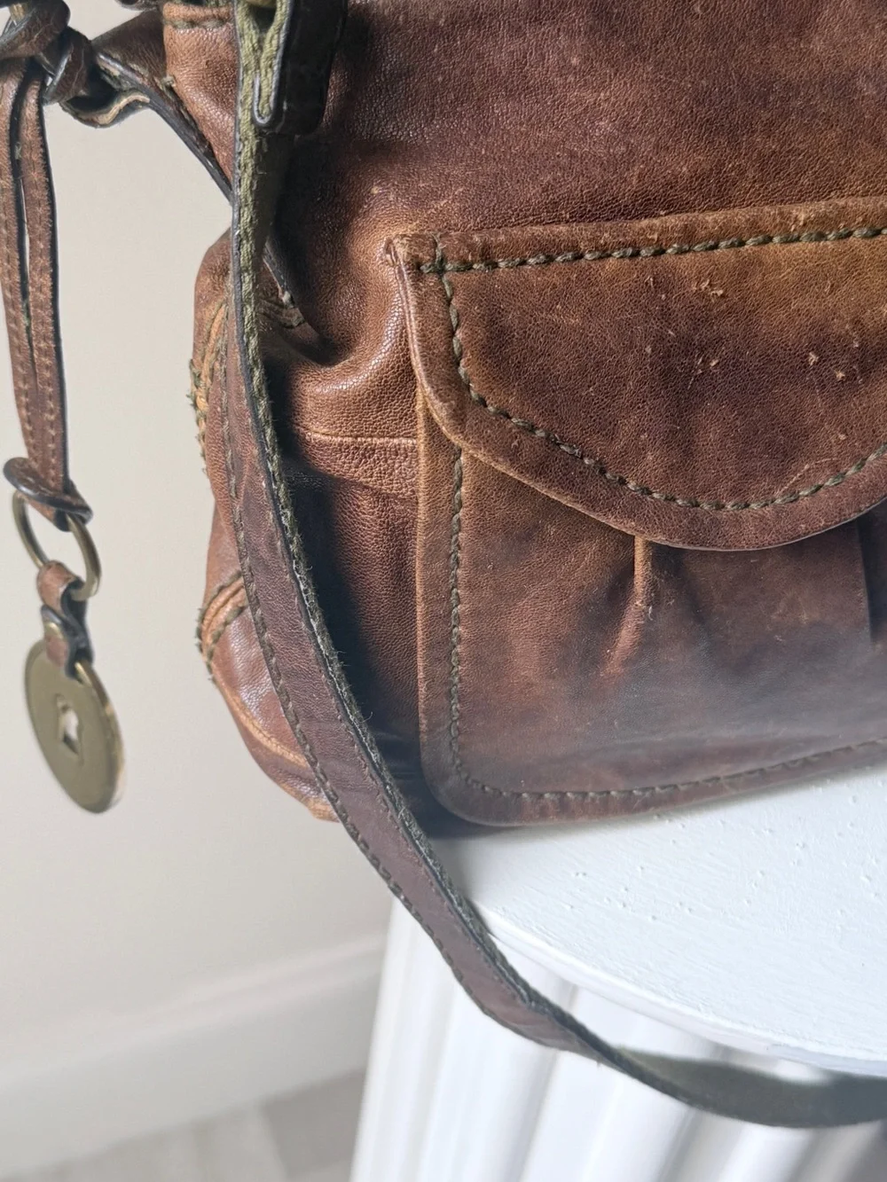 Hyper Distressed Fossil Vintage Bag.